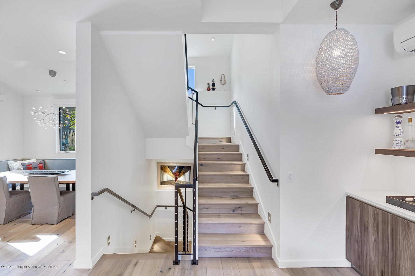 1098 Waters Avenue Aspen, CO 81611 - Photo 16 of 45 a view of entryway and hall with wooden floor