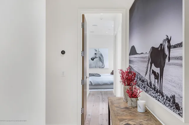 a bedroom with a large bed and a couch