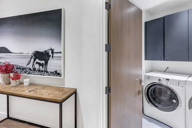 a bedroom with furniture and window