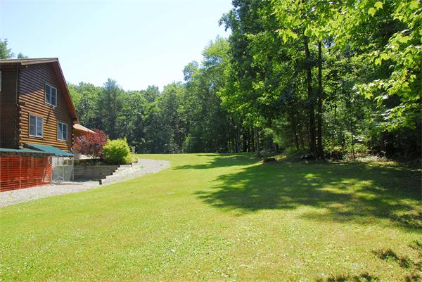 118 Groton Road Shirley, MA 01464 - Photo 3 of 15 a view of a house with a yard