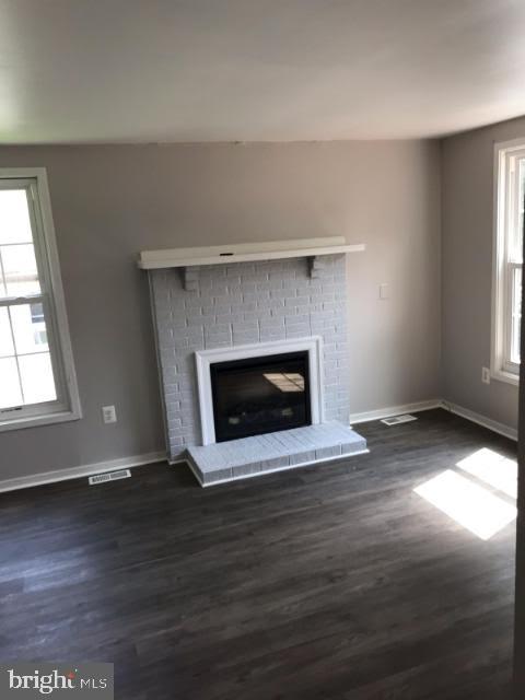 7959 Elizabeth Road Pasadena, MD 21122 - Photo 2 of 6 Living Room with fireplace