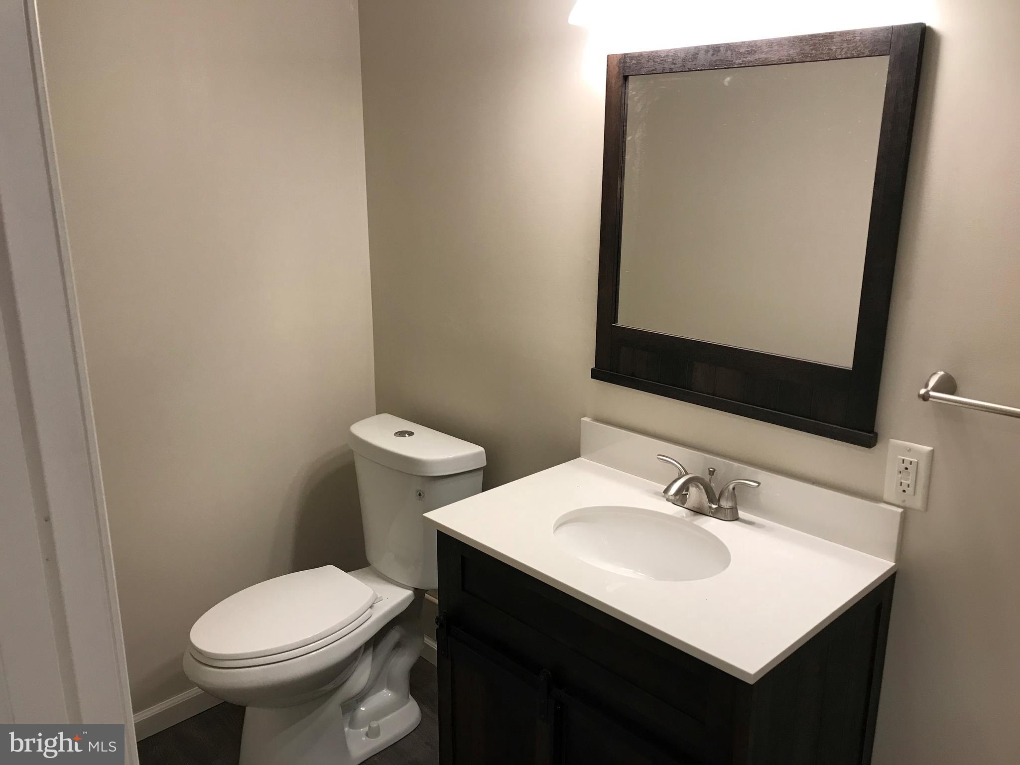 7959 Elizabeth Road Pasadena, MD 21122 - Photo 5 of 6 lower level half bath