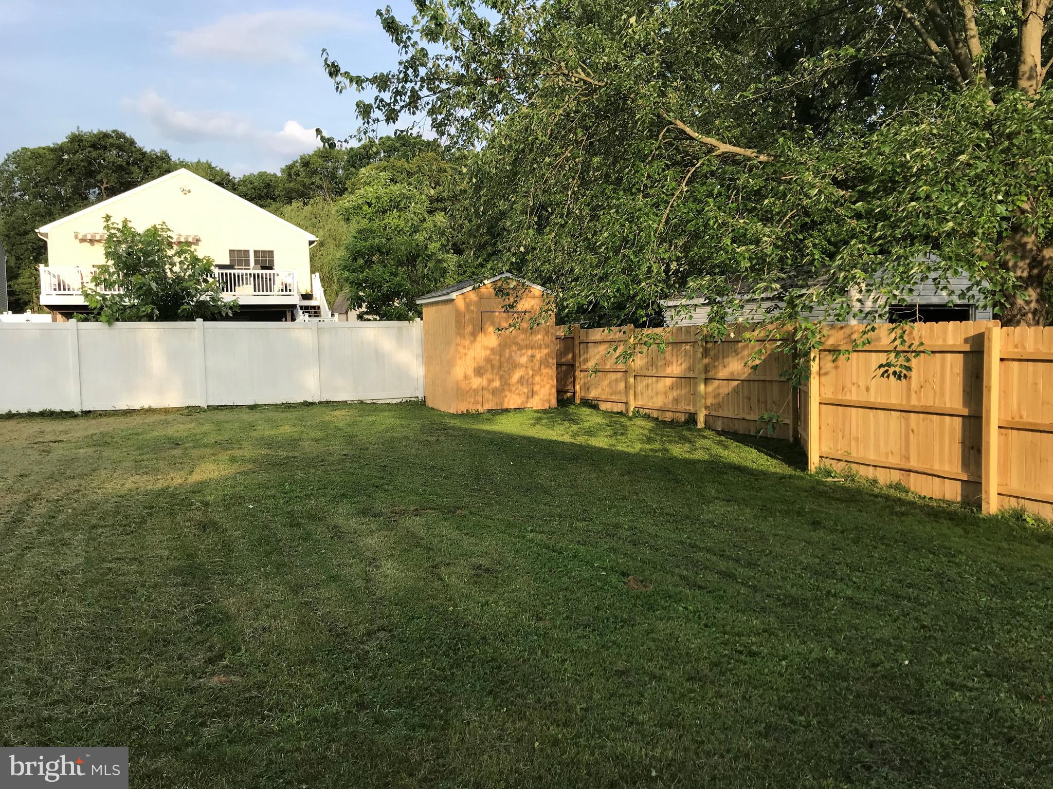 7959 Elizabeth Road Pasadena, MD 21122 - Photo 6 of 6 fenced yard with shed