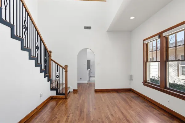 a view of entryway with wooden floor