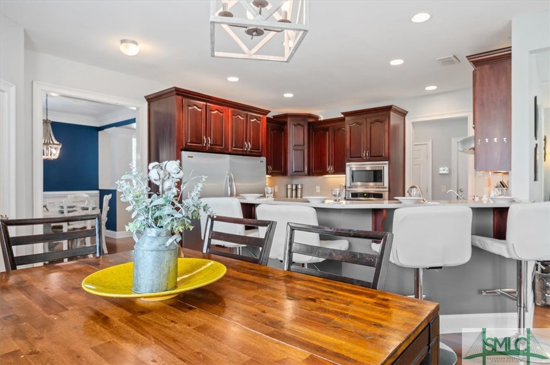 111 Stadium Drive Guyton, GA 31312 - Photo 13 of 50 Breakfast Room to Kitchen