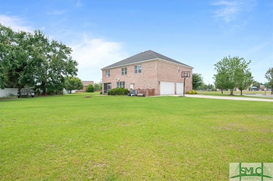 111 Stadium Drive Guyton, GA 31312 - Photo 46 of 50 True 3 Car Oversized Garage and Driveway