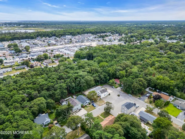 an aerial view of a city with lots of residential buildings