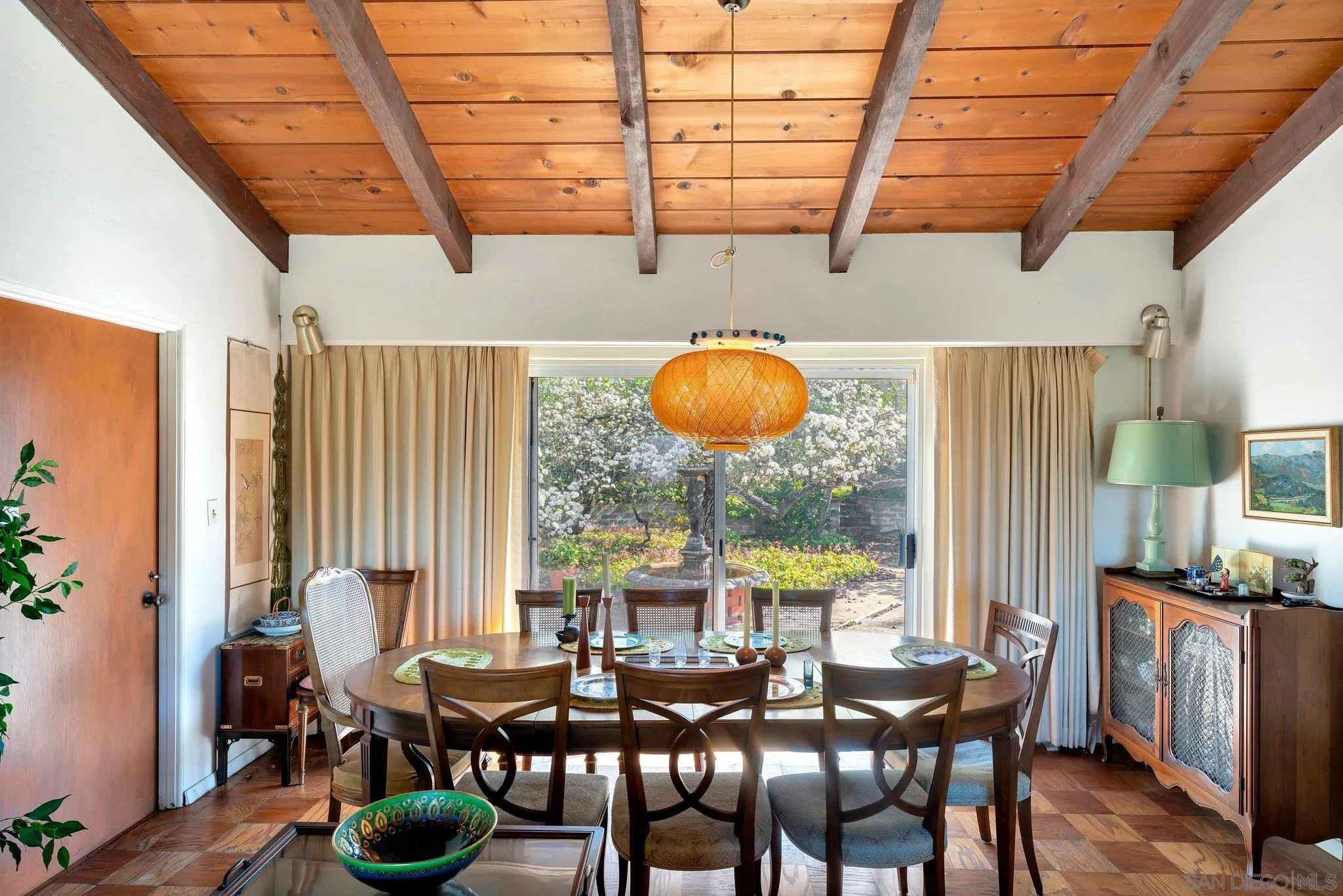 1351 Rhoda Drive La Jolla, CA 92037 - Photo 12 of 20 a view of a dining room with furniture and chandelier