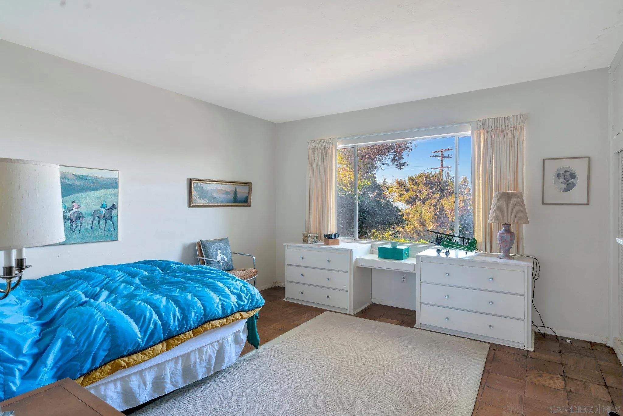 1351 Rhoda Drive La Jolla, CA 92037 - Photo 17 of 20 a bedroom with a bed and window