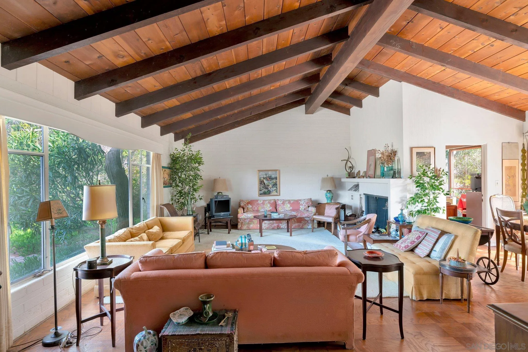 1351 Rhoda Drive La Jolla, CA 92037 - Photo 9 of 20 a living room with furniture a fireplace and a table