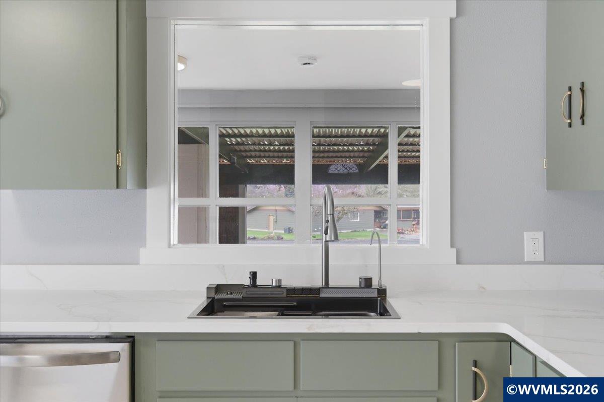 28411 Liberty Road Sweet Home, OR 97386 - Photo 22 of 50 a kitchen with a sink and a window