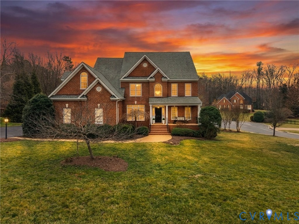14335 Lander Road Midlothian, VA 23113 - Photo 2 of 70 a front view of a house with a yard