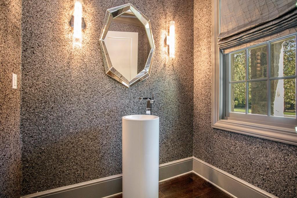 1 Duck Pond Road Scarsdale, NY 10583 - Photo 11 of 48 a bathroom with a sink and a mirror
