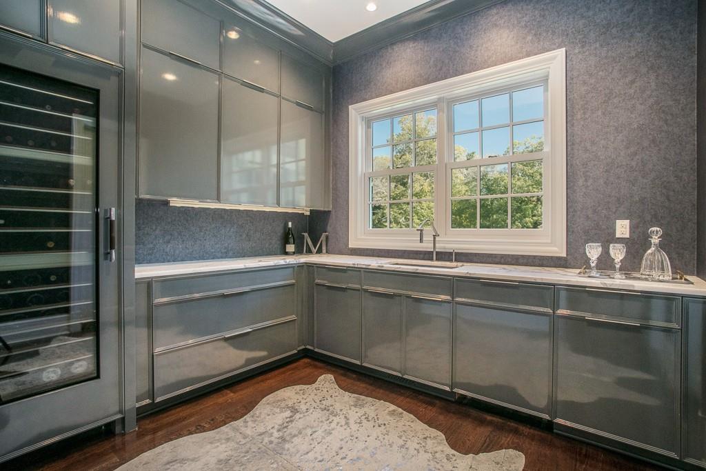 1 Duck Pond Road Scarsdale, NY 10583 - Photo 13 of 48 a kitchen with a sink and cabinets