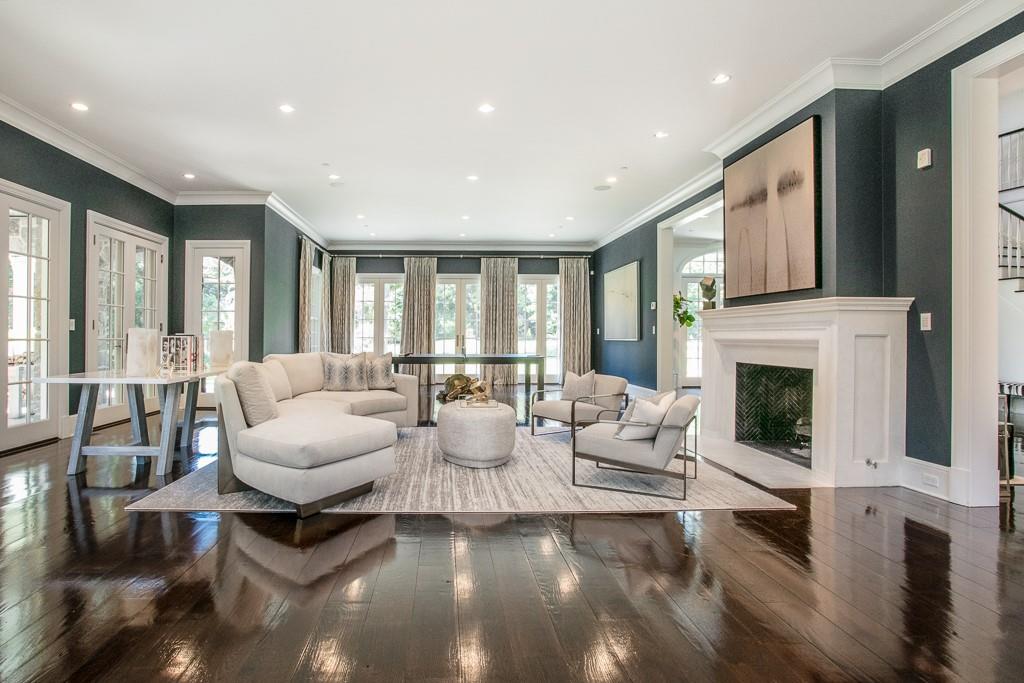 1 Duck Pond Road Scarsdale, NY 10583 - Photo 17 of 48 a living room with fireplace furniture and a large window