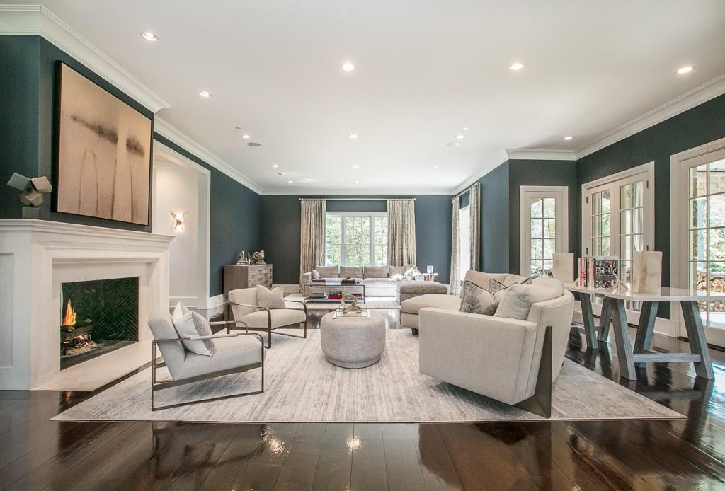 1 Duck Pond Road Scarsdale, NY 10583 - Photo 18 of 48 a living room with furniture and a fireplace