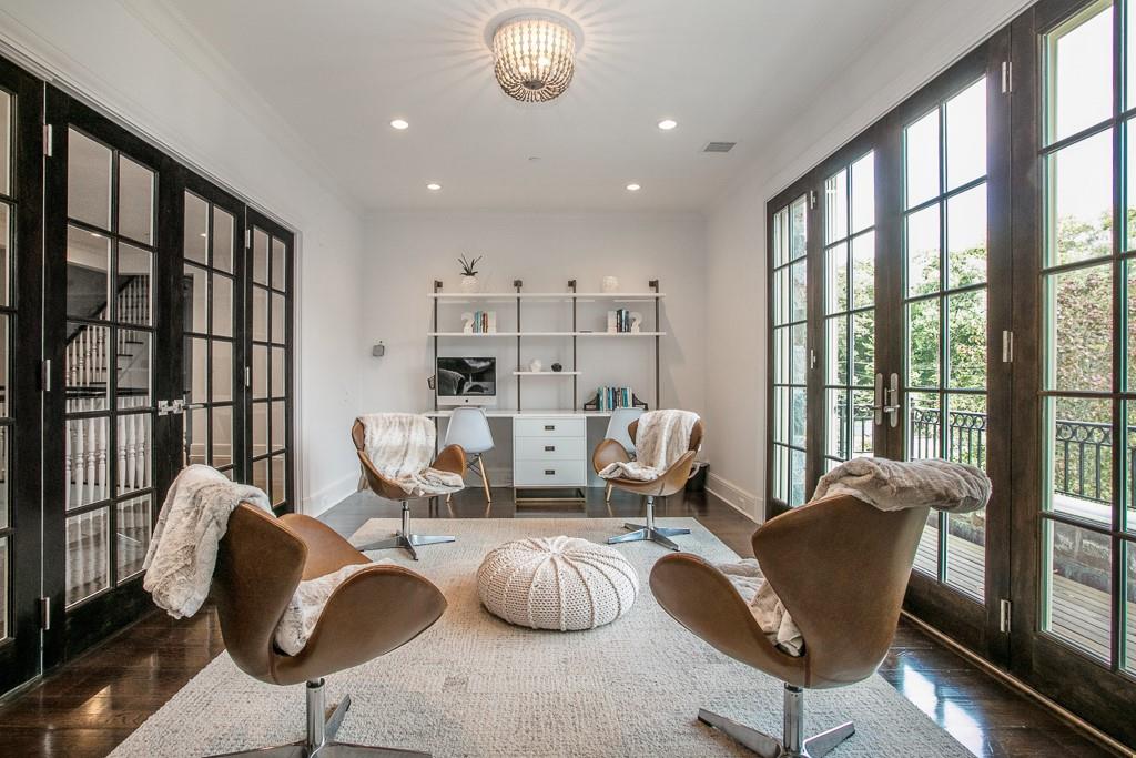 1 Duck Pond Road Scarsdale, NY 10583 - Photo 22 of 48 a room with furniture or couches and a large window