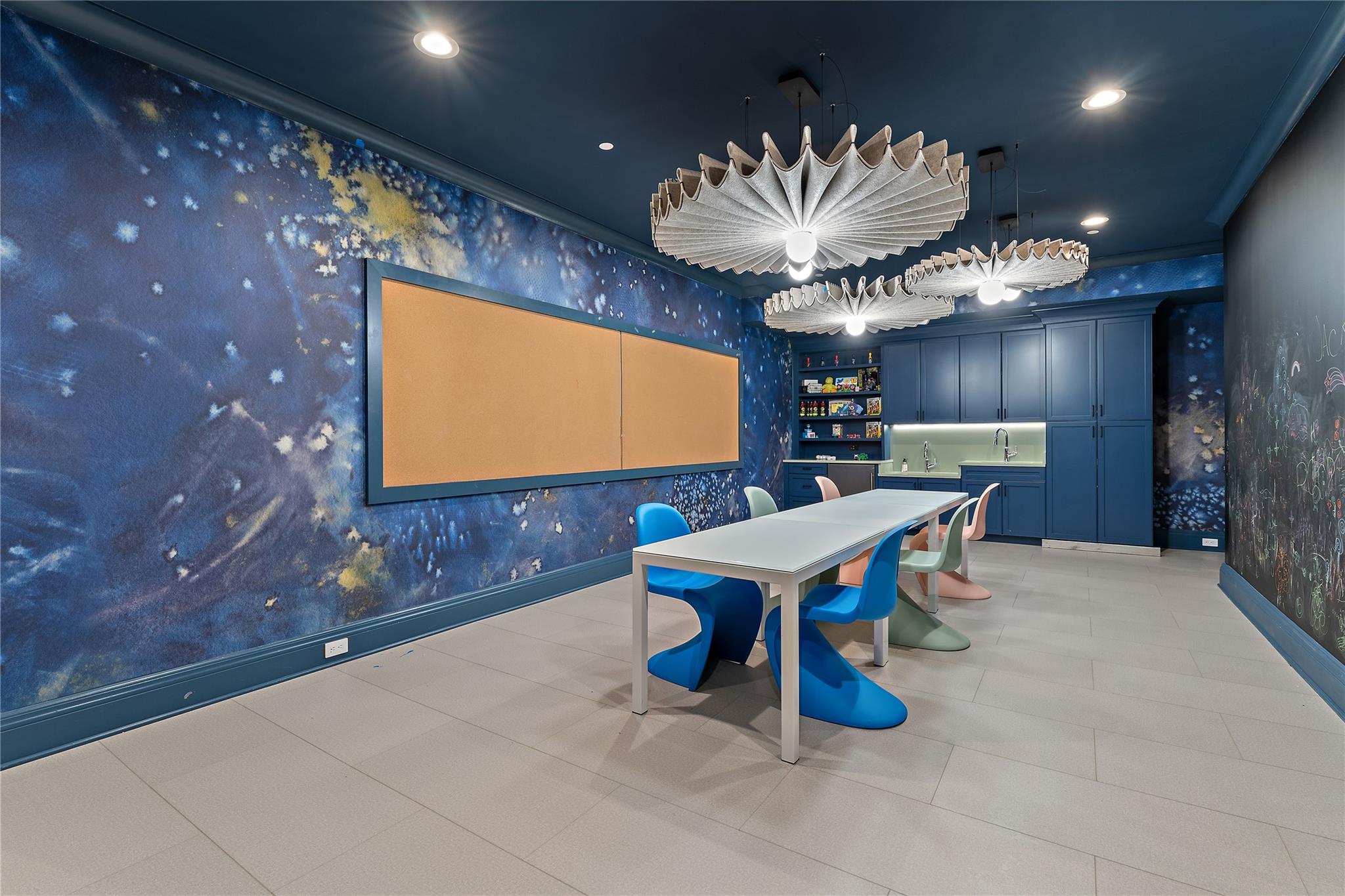 1 Duck Pond Road Scarsdale, NY 10583 - Photo 33 of 48 a room with furniture and a projector screen