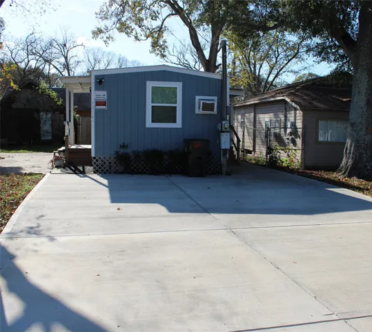 a front view of a house with yard