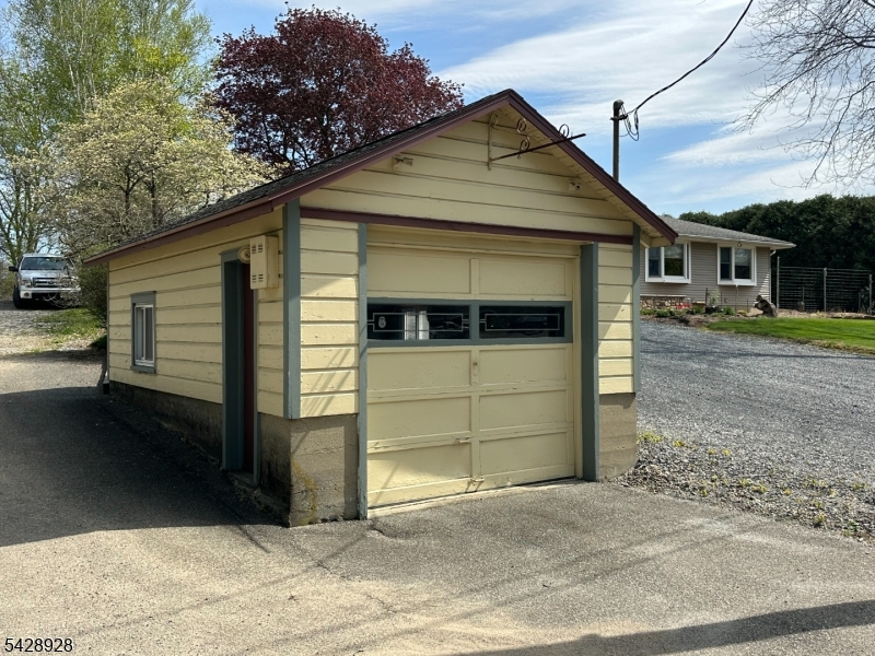 13 Cemetery Road Great Meadows, NJ 07838 - Photo 19 of 20 a view of a house with a garage