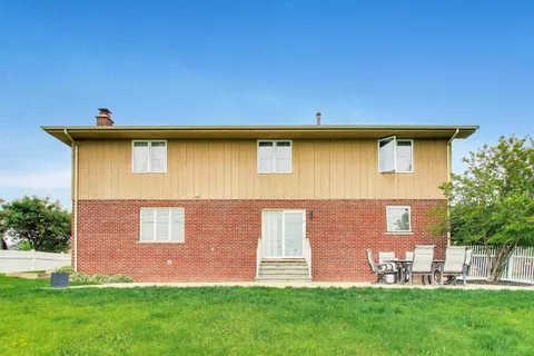 a front view of house with yard