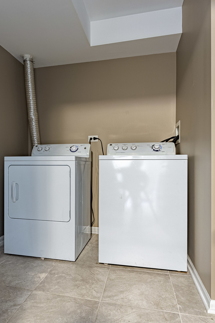133 Willey Street Gilberts, IL 60136 - Photo 20 of 21 a utility room with a wooden floor