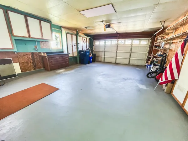 a view of a garage with furniture