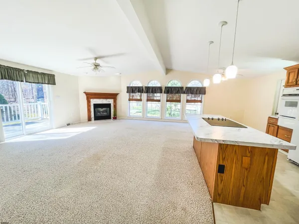 a view of a kitchen and a windows