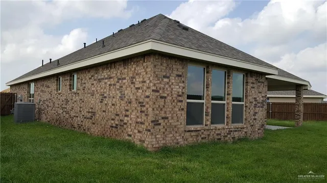 an empty room with a empty space and window