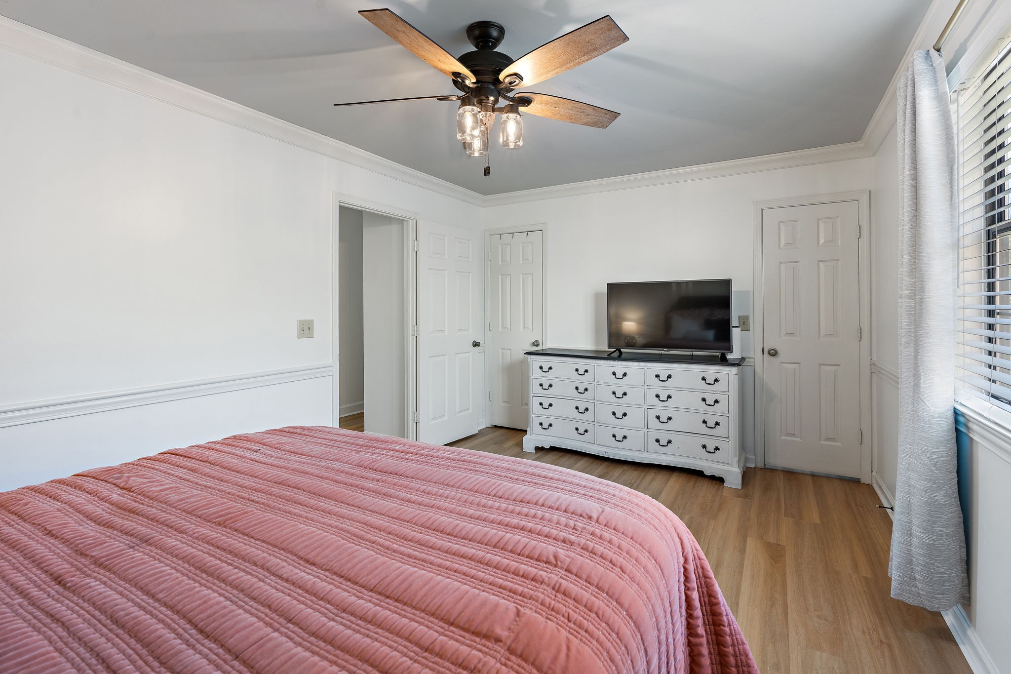 1082 General George Patton Road Nashville, TN 37221 - Photo 14 of 21 a bedroom with a bed and flat screen tv