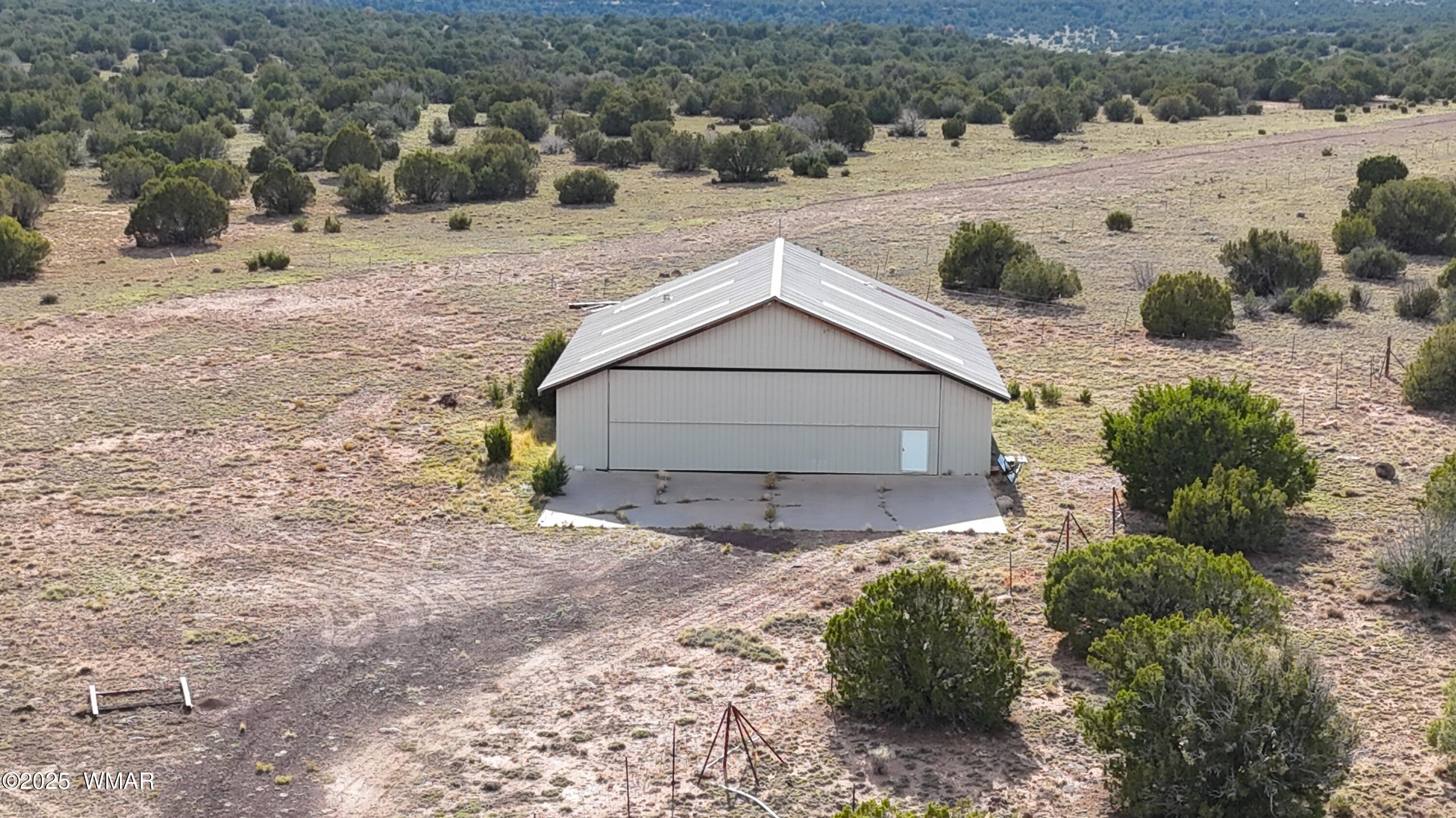 8051 Concho Az 85924 Concho, AZ 85924 - Photo 1 of 7 a view of a backyard of the house