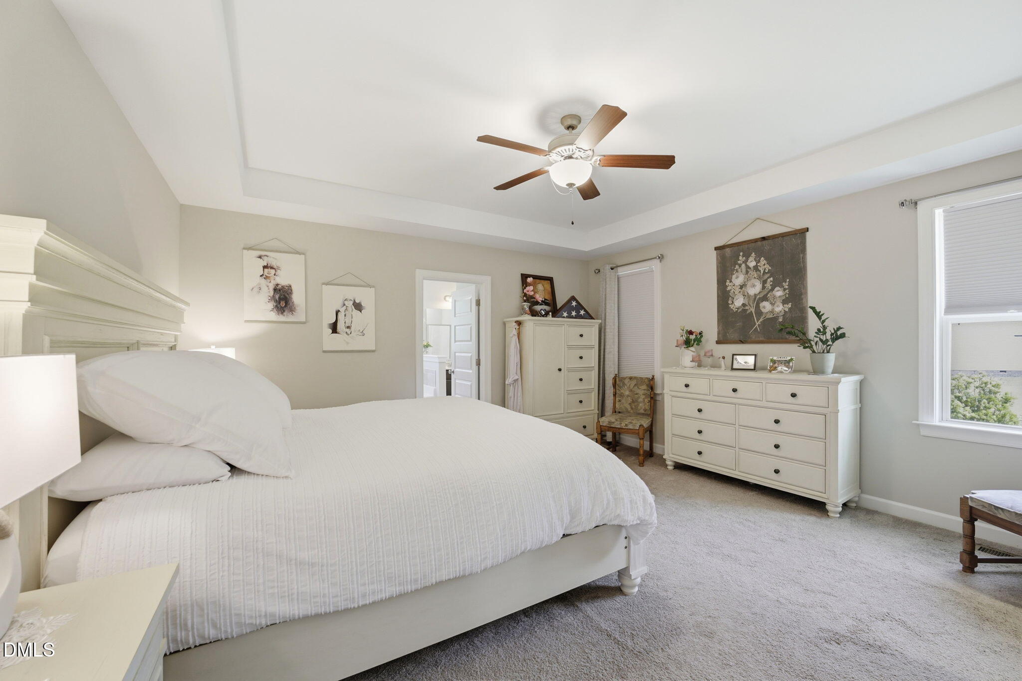 1547 Lassiter Pond Road Four Oaks, NC 27524 - Photo 19 of 45 a bedroom with a bed and dresser