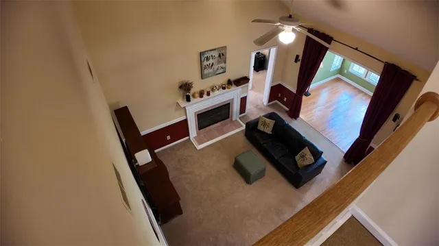 a view of living room with furniture and a flat screen tv