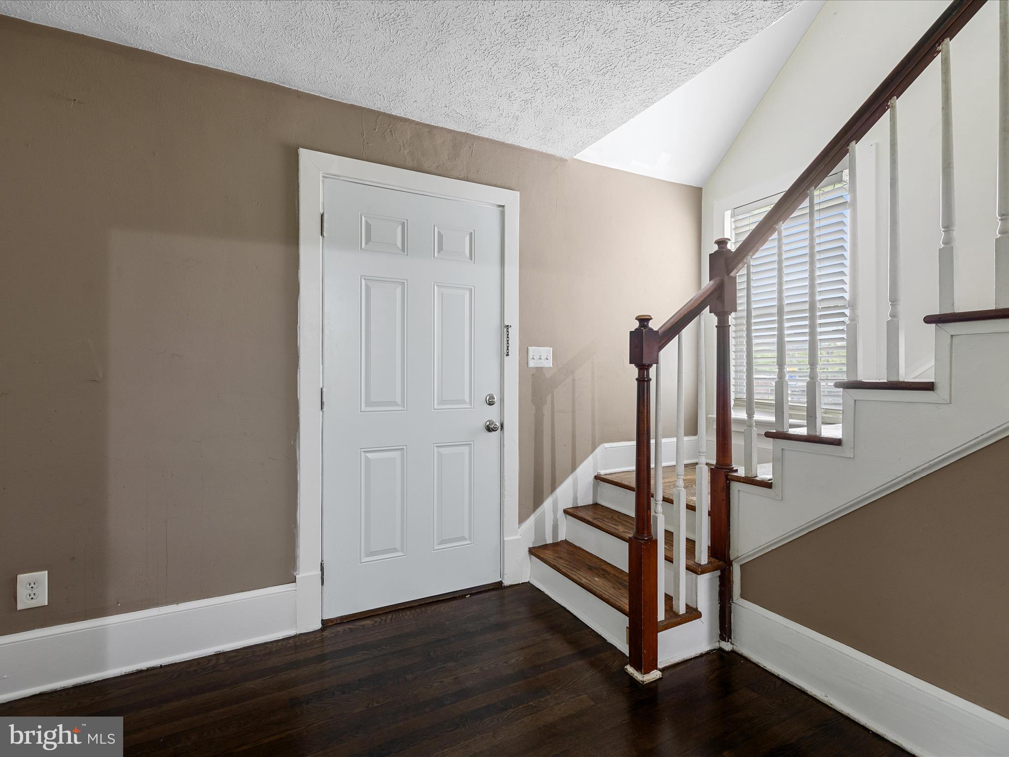 276 Gore Road Gore, VA 22637 - Photo 8 of 48 a view of entryway with wooden floor and stairs