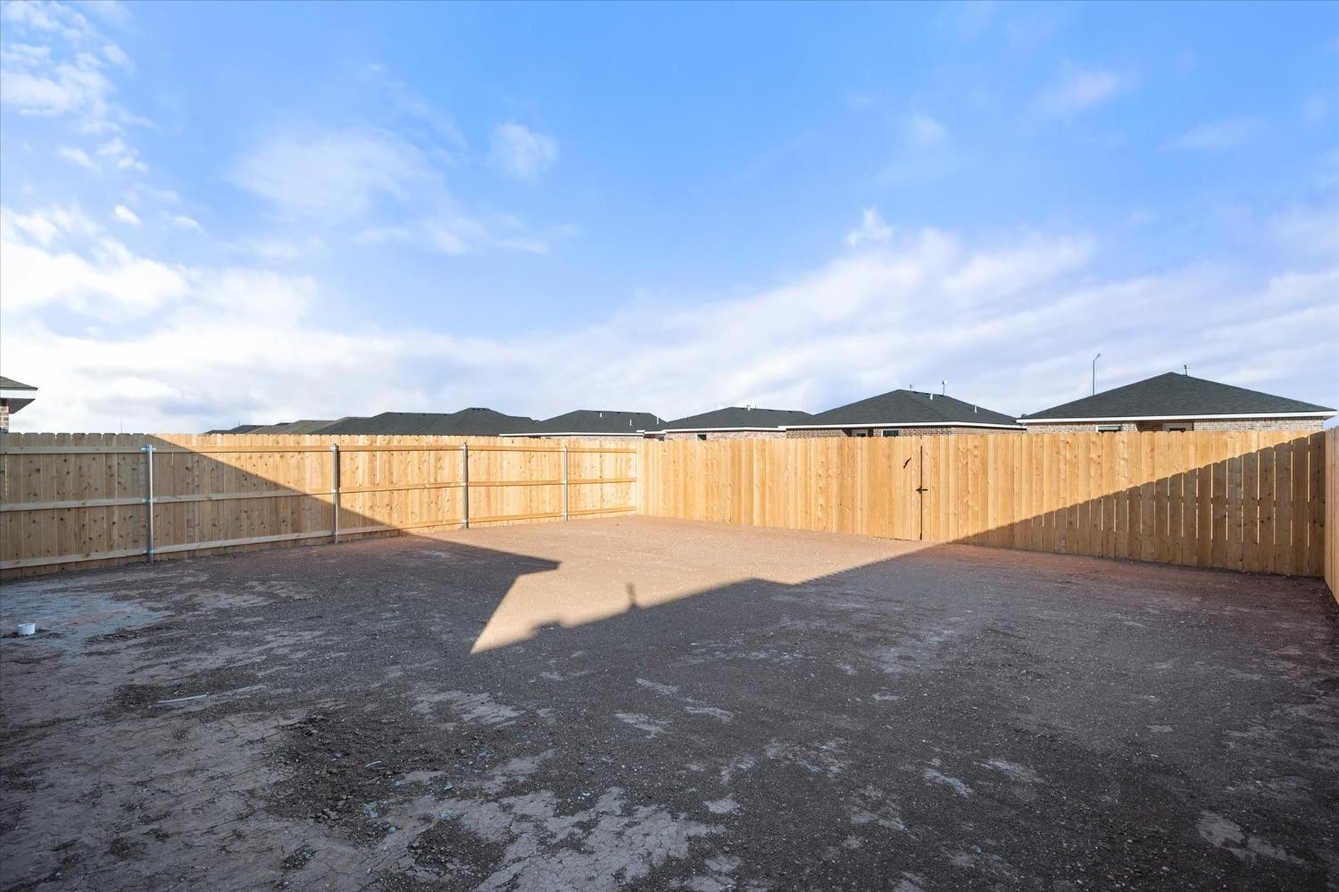 5516 Princeton Street Lubbock, TX 79416 - Photo 17 of 17 a view of outdoor space with swimming pool and lake view
