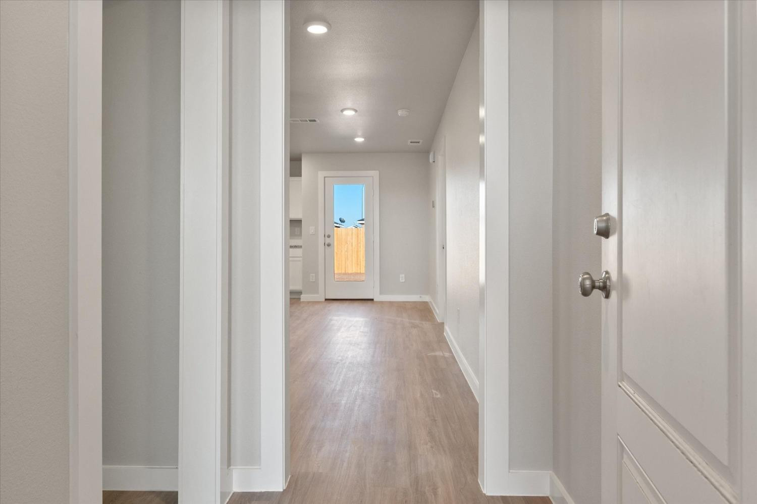 5516 Princeton Street Lubbock, TX 79416 - Photo 2 of 17 a view of hallway with wooden floor