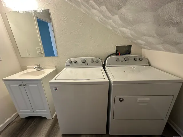 a utility room with dryer and washer