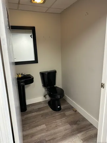 a view of workspace with wooden floor washer and dryer