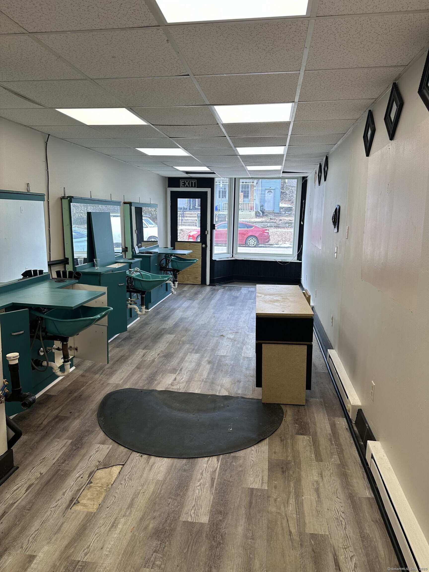 197 Central Avenue Norwich, CT 06360 - Photo 16 of 16 a living room with furniture and a flat screen tv