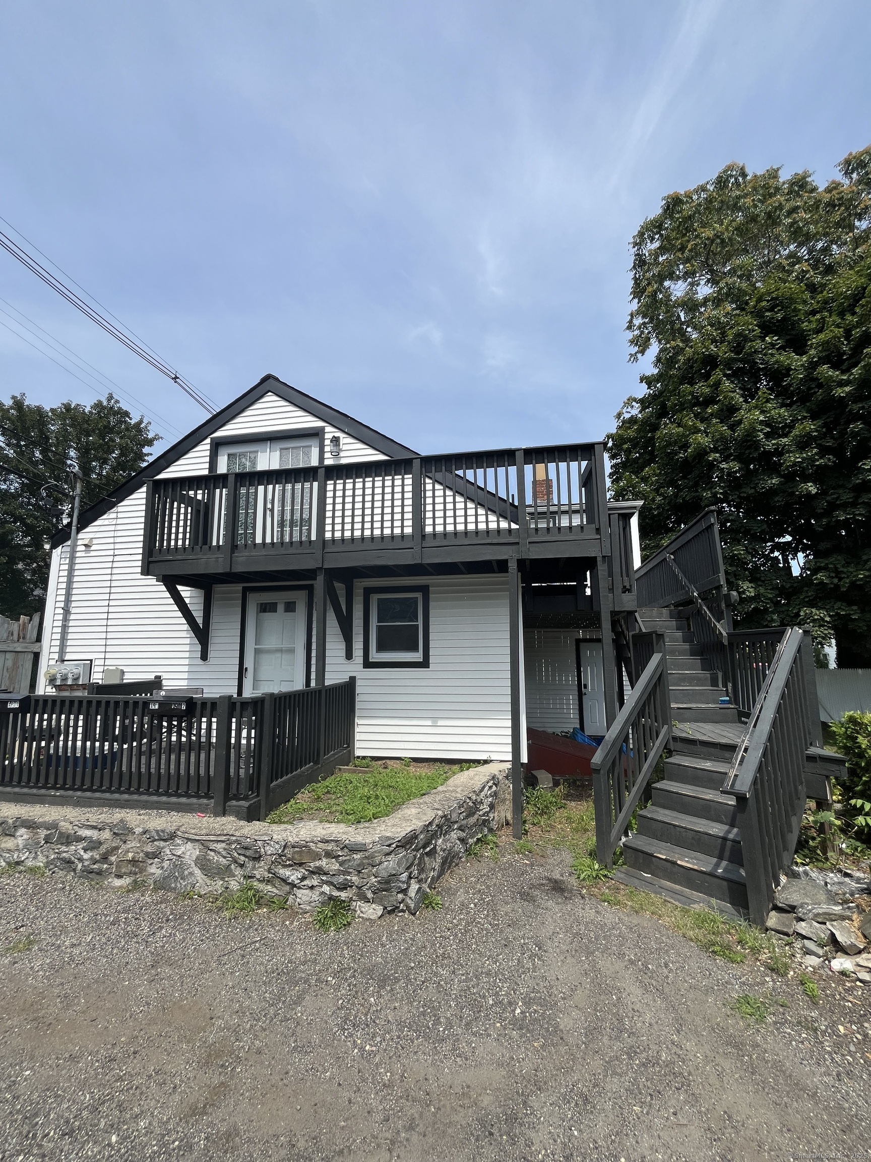 197 Central Avenue Norwich, CT 06360 - Photo 6 of 16 front view of a house with a yard