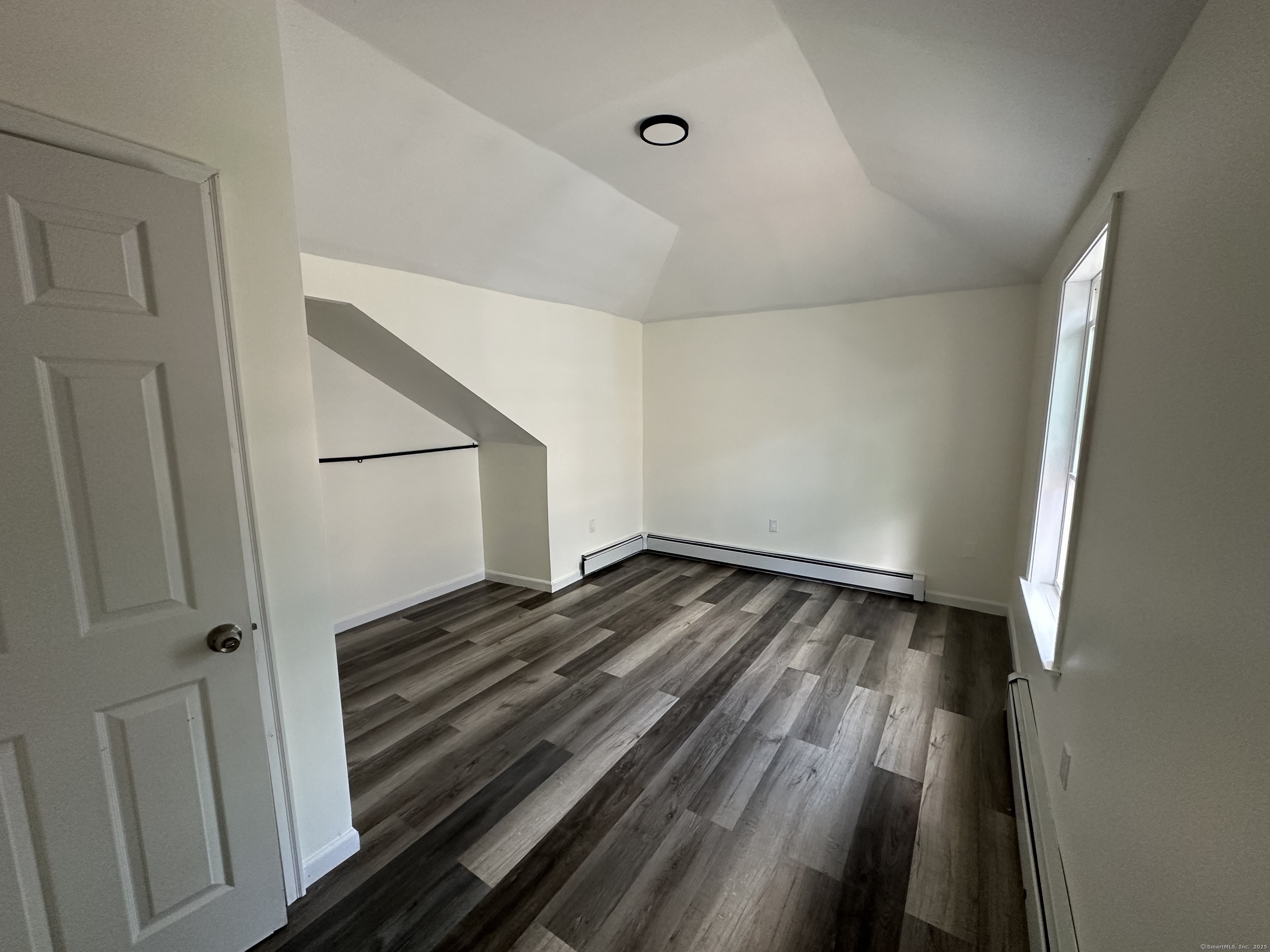 197 Central Avenue Norwich, CT 06360 - Photo 8 of 16 a view of a room with wooden floor