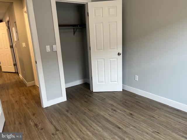 6339 Morton Street Philadelphia, PA 19144 - Photo 7 of 13 an empty room with wooden floor and entrance