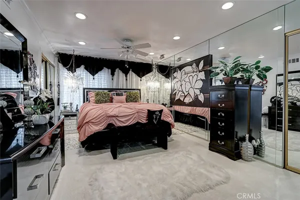 a bedroom with a bed and a walk in closet