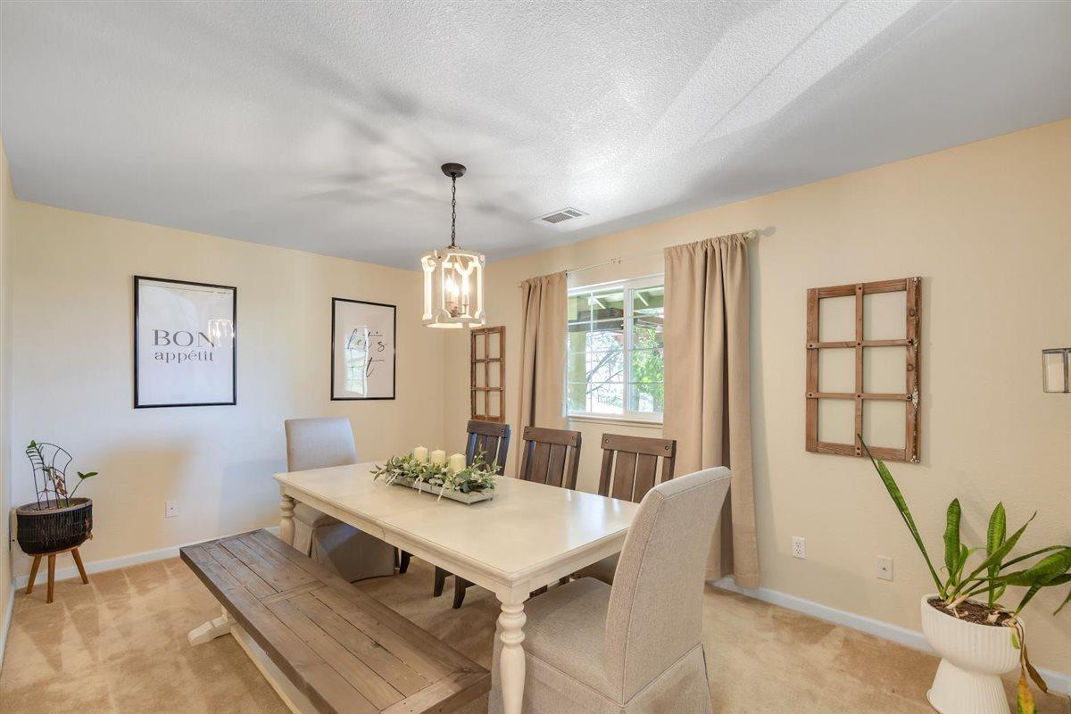 2441 Quail Hill Road Copperopolis, CA 95228 - Photo 17 of 91 Great dining room OR a 4th bedroom.., just add the doors back on!