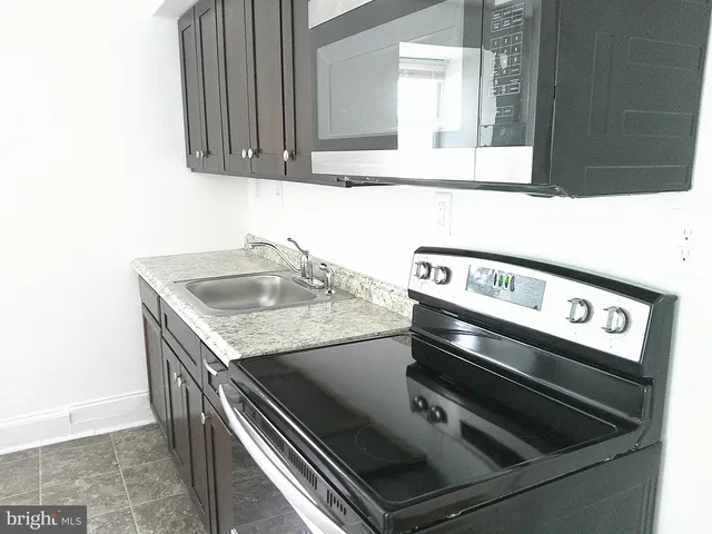 a utility room with washer and dryer