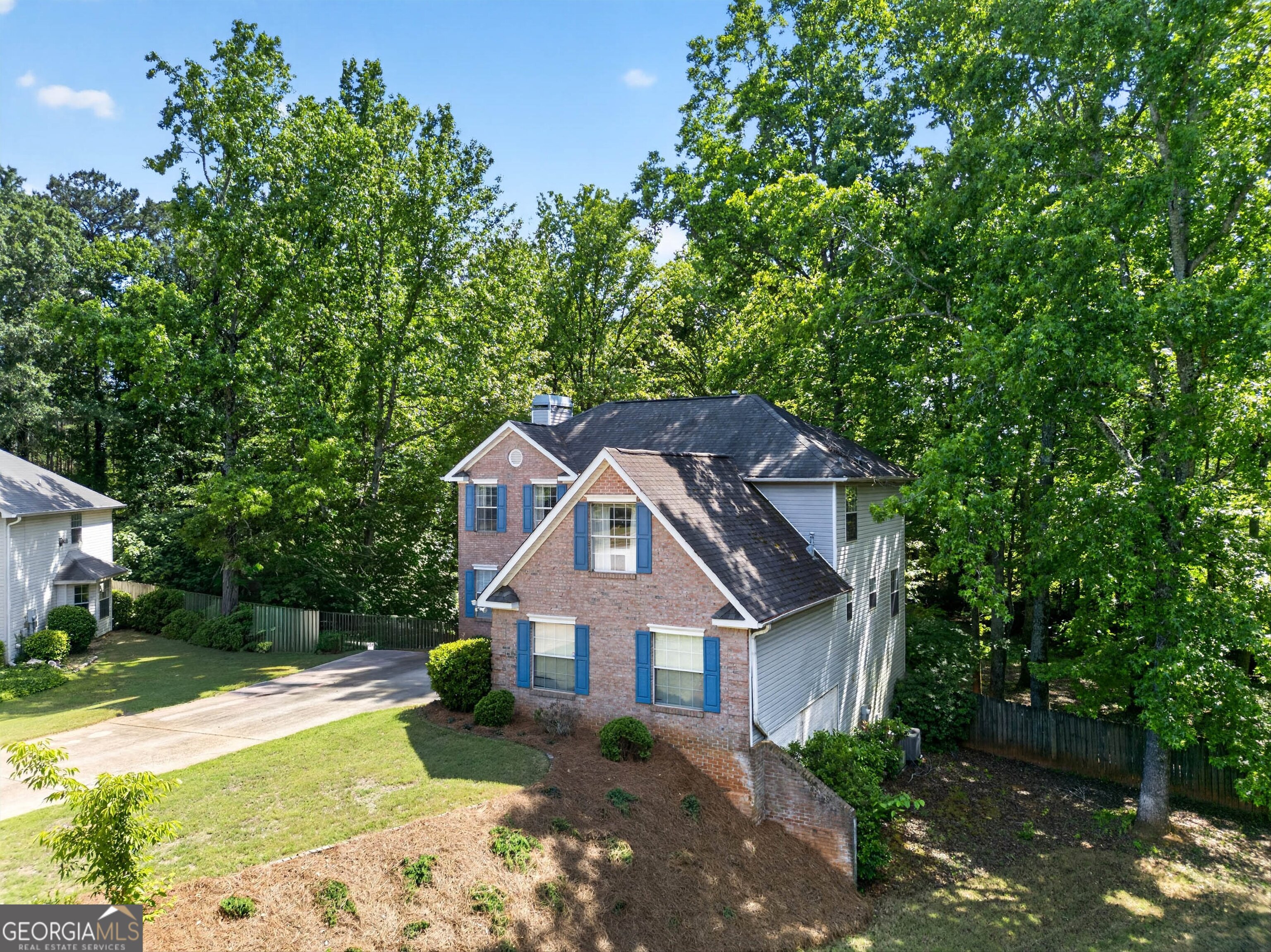 101 Emerald Lane Hampton, GA 30228 - Photo 63 of 72 a front view of a house with a garden