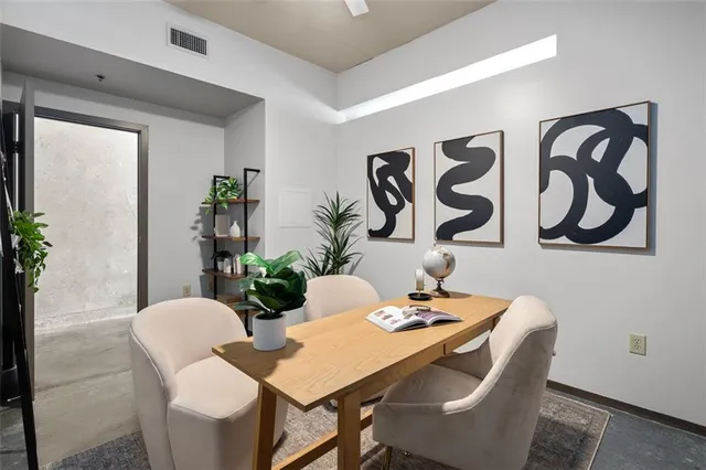 a view of a hallway with washer and dryer