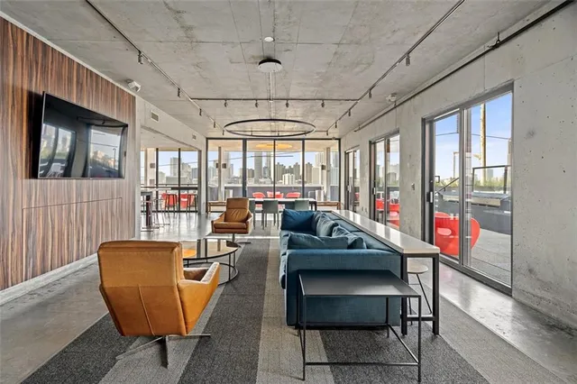 a view of a dining room with furniture window and outside view