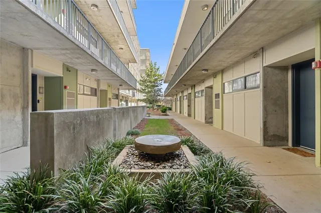 a view of a building with a yard