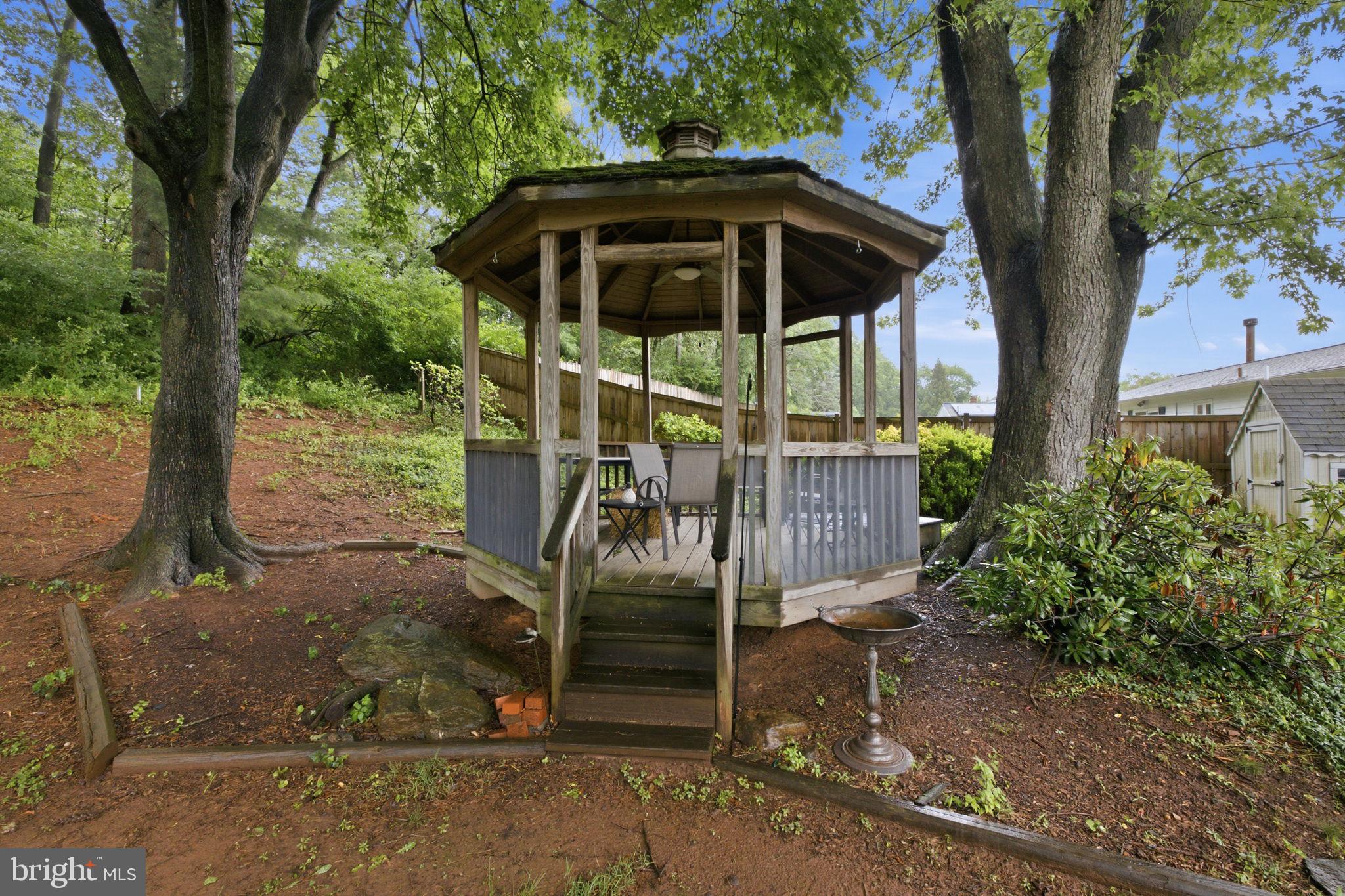 11937 Bayswater Road Gaithersburg, MD 20878 - Photo 45 of 55 Charming gazebo nestled in nature.